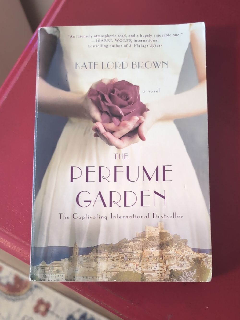 The Perfume Garden by Kate Lord Brown - White Cover with Purple Rose
